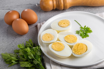 Sliced ​​boiled eggs on the table.