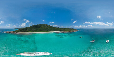 HDRI seamless spherical aerial 360-degree panorama of La Digue island, Seychelles. View of the...