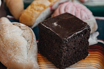 Chocolate Cake with Concha, Bread on Serape