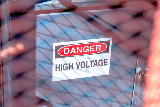 Danger high voltage sign on a gray electrical fuse box at San Jose, California