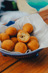 Colorful Food Beach Appetizer Starts Snacks Fresh Delicious Menu Recipe Meal Meat Chicken Fries Fish Seafood Beer on a wooden table
