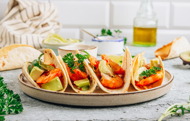 Diet healthy tacos with shrimps and avocado.