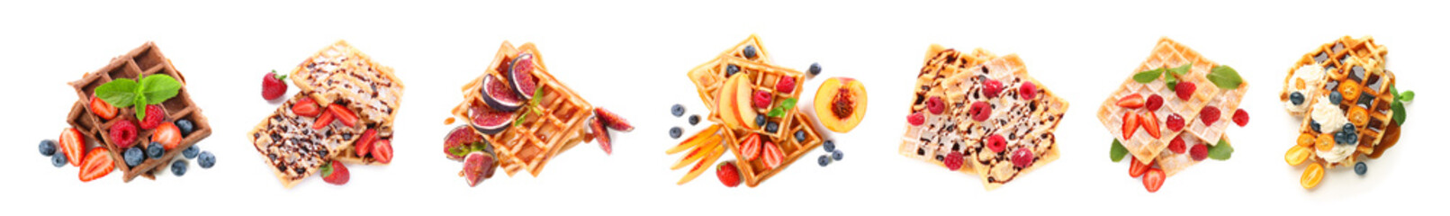 Set of tasty Belgian waffles on white background, top view