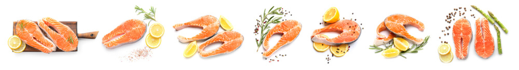 Set of raw salmon steaks with spices and lemons on white background, top view