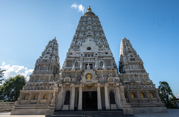 Fototapeta premium The large mock-up of Mahabodhi pagoda from Bodhgaya India building in Wat Chong Kham temple in Ngao district of Lampang province of Thailand.