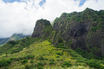 lush and mountainous iao valley amidst clouds
