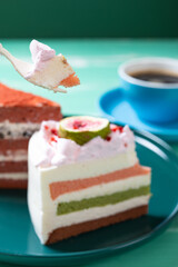 eating sweet cakes and cup of coffee vertical composition