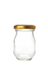 Glass jar with golden cap isolated on white background