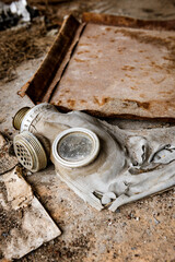 Fototapeta na wymiar Used gas mask and equipment in Chornobyl disaster area