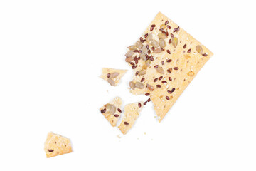 Multigrain crispbread with sesame, flax and sunflower seeds isolated on white background. Healthy snack. Top view 