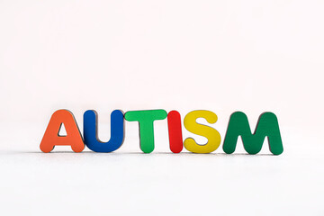 Word AUTISM on white background