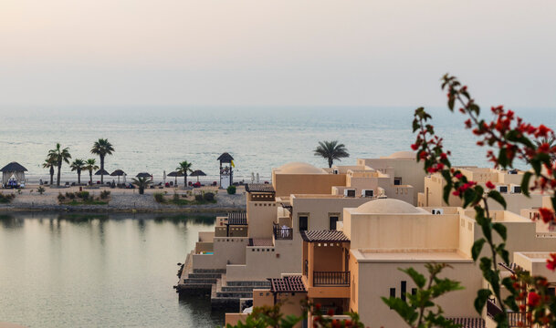 Ras Al Khaimah, UAE - 04.04.2022 - View of the beach and private villas at The Cove Rotana Resort. Holiday