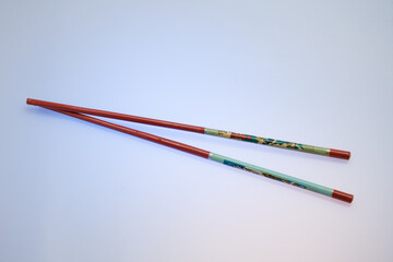 Old Asian chopsticks isolated 