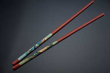 Old Asian chopsticks isolated 