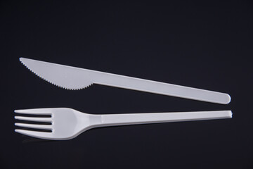 white Plastic fork and knife 