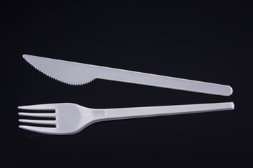 white Plastic fork and knife 