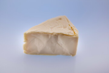 Cheese triangles on a reflective surface,Processed cheese