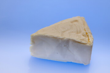 Cheese triangles on a reflective surface,Processed cheese