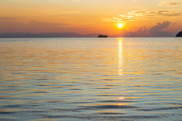 Beach and sea view on Lipe island, Satun Province, Thailand, andaman sea where you can watch the sunrise and sunset on the same beach.