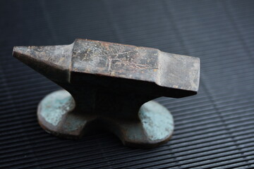 old small iron anvil 