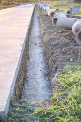 Construction site ,digging the soil to prepare for laying concrete sewers