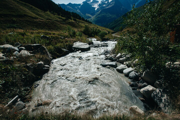 Stormy stream of Mountain river in Terskol Caucasus Russia