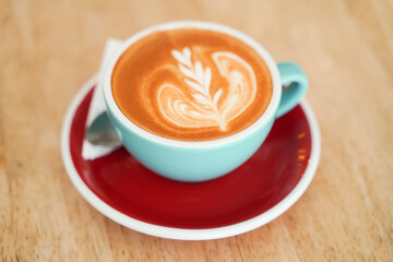 Latte coffee on wood table