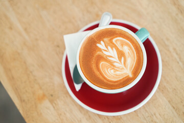 Latte coffee on wood table