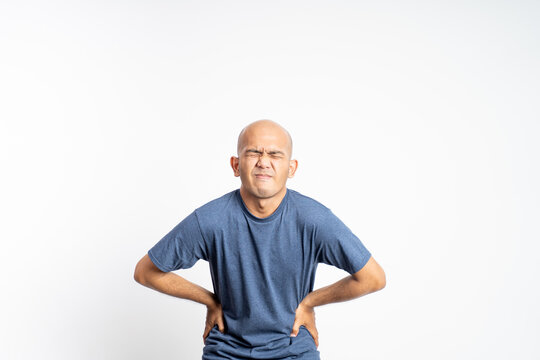 Asian Bald Man Having Stomach Ache Feeling Twisted On Isolated Background