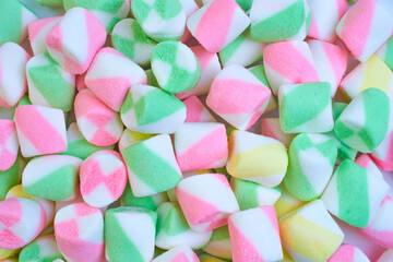 Background or texture of colorful blue and pink marshmallows.Multi-colored marshmallows.