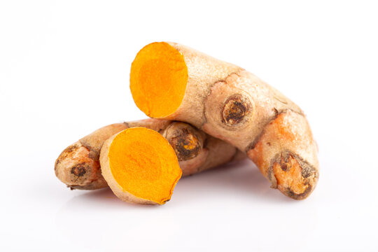 Turmeric powder and turmeric root isolated on white background ,Top view