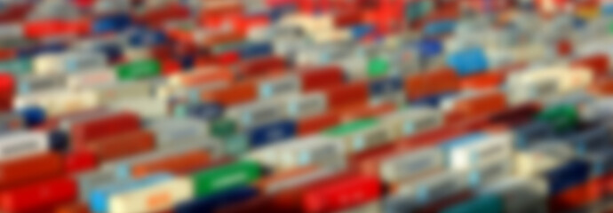 Obraz premium defocused colorful shipping containers yard depot blurred cargo port congestion background banner
