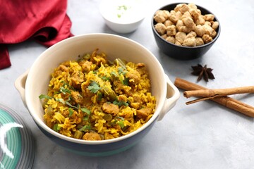 Soya chunks Biryani. Basmati rice cooked with Soyabean or Soya vadi along with spices and vegetables. It's a complete protein rich and nutritious one pot meal. Copy space