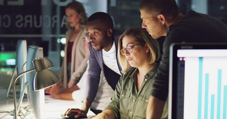 This office stays abuzz with productivity no matter the hour. Group of confident diverse and different aged business people working together at night on a computer in an office during the late shift 