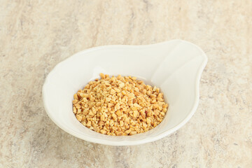 Crunched roasted peanut in the bowl