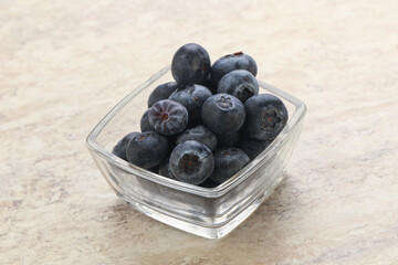 Sweet ripe blueberry heap in the bowl