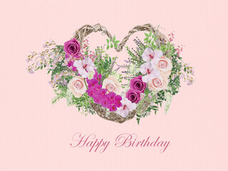 Wicker wreath with roses, orchids and spring herbs. Happy Birthday card in romantic style. 