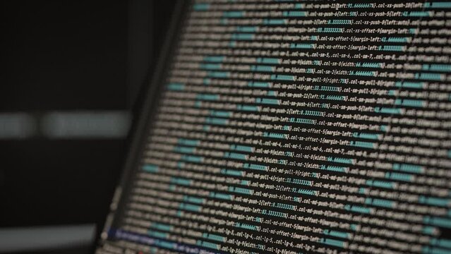 Close-up of a computer screen, with program code. A major project is being developed.