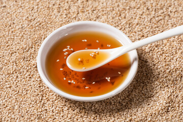 Sesame seeds and sesame oil background