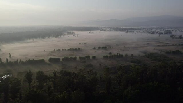 Aerial shot Mexico city Cuemanco, sunrise and fog