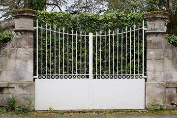 white old steel retro design metal aluminum gate of vintage house