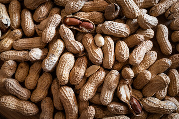 Peanuts in their shells. Texture background with peanuts
