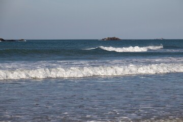 waves crashing on the beach