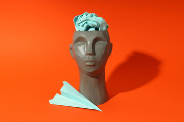Concept of problems with memory, amnesia disease on orange background