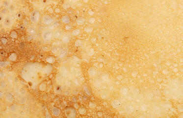 Pan fried pancake as a background.