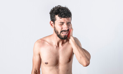 Fototapeta premium Person with earache on isolated background, man with earache on isolated background, ear disease concept
