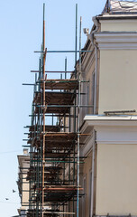 Scaffolding at the wall of the building.