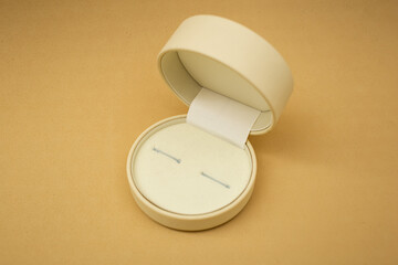 Beige jewelry box on beige background