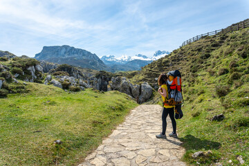 A mother with her son in the Buferrera mines in the Covadonga lakes. Asturias. Spain