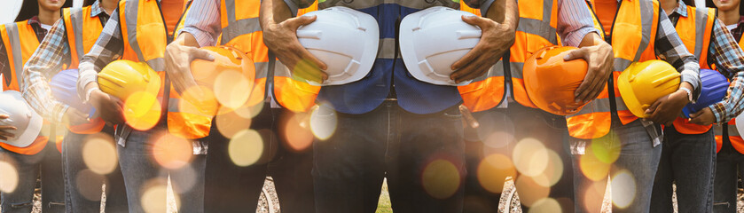 Construction engineer discusses with architect at the construction site. or high-rise construction sites banner